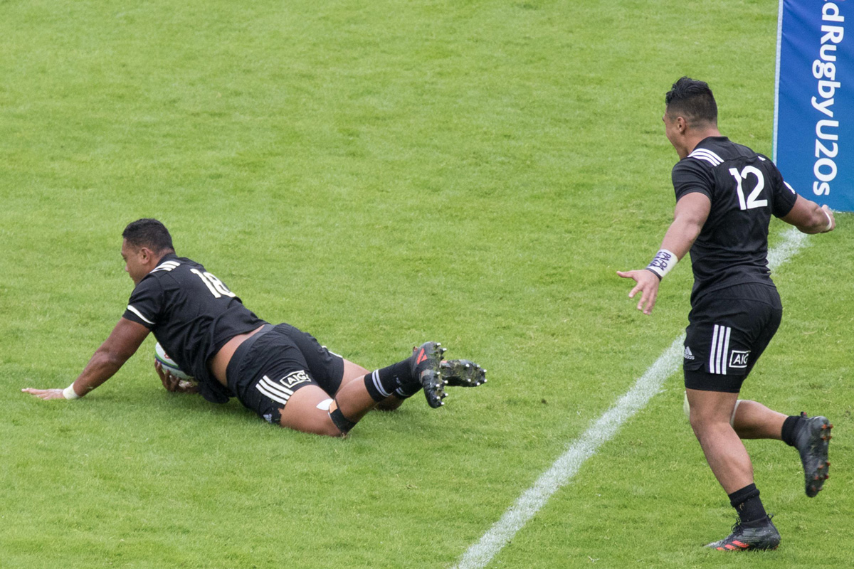 Replacement prop Tevita Malile'o scores a blinder. Photo: Bernard Rivière / World Rugby.